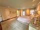 This spacious main bedroom features wood floors, neutral walls, a large window, and bright recessed lighting at 1242 Star Ne Dr, Brookhaven, GA 30319