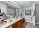 This bathroom has a double vanity, a bathtub, and a stand-up shower at 248 Springbottom Dr, Lawrenceville, GA 30046