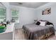Bedroom featuring a window and neutral color pallet at 248 Springbottom Dr, Lawrenceville, GA 30046