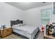 Bright bedroom with large window and comfortable queen bed at 248 Springbottom Dr, Lawrenceville, GA 30046