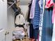 This is a walk-in closet with tons of storage space at 248 Springbottom Dr, Lawrenceville, GA 30046