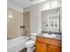 Bathroom featuring a bathtub, toilet, and vanity with a mirror at 502 Sw Pryor Sw St # 325, Atlanta, GA 30312