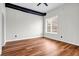 Spacious bedroom featuring rich hardwood floors and a bright window at 502 Sw Pryor Sw St # 325, Atlanta, GA 30312