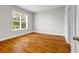 Comfortable bedroom with hardwood floors and natural light from a window at 502 Sw Pryor Sw St # 325, Atlanta, GA 30312