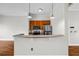 Partial kitchen with stainless steel appliances, wood cabinets, and light colored countertop at 502 Sw Pryor Sw St # 325, Atlanta, GA 30312