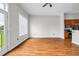 Open concept living space and kitchen with balcony and view of trees and nature at 502 Sw Pryor Sw St # 325, Atlanta, GA 30312