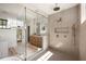 Elegant bathroom with glass enclosed shower, marble floors, and vanity with double sinks at 555 Orme Ne Cir, Atlanta, GA 30306