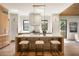 Bright, modern kitchen with a large island, quartz countertops, and stainless steel appliances at 555 Orme Ne Cir, Atlanta, GA 30306