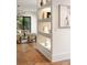 Modern living room with built-in display shelves and herringbone wood floors at 555 Orme Ne Cir, Atlanta, GA 30306