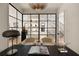 Office space featuring stylish light fixture, black-framed windows, and modern decor at 555 Orme Ne Cir, Atlanta, GA 30306