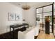 Bright office with contemporary lighting, dark wood floors and black-framed windows at 555 Orme Ne Cir, Atlanta, GA 30306