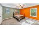 Bedroom featuring a ceiling fan and a bed with natural light from the windows at 600 River Bend Sw Cir, Smyrna, GA 30082