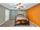 Bedroom featuring a ceiling fan and a bed with natural light from the windows at 600 River Bend Sw Cir, Smyrna, GA 30082