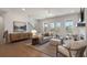 Comfortable living room with stylish furniture, fireplace, and natural light at 160 Chiswick Cir # 2, Alpharetta, GA 30009