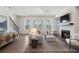 Cozy living room with fireplace, modern decor, and staircase access at 160 Chiswick Cir # 2, Alpharetta, GA 30009