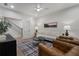 A living room with plush seating, stylish decor, and a view of the stairs at 160 Chiswick Cir # 2, Alpharetta, GA 30009