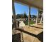 Spacious porch with stone flooring and views of the surrounding neighborhood at 160 Chiswick Cir # 2, Alpharetta, GA 30009