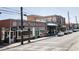 Streetscape of a commercial district with a variety of shops and restaurants at 214 College Cir # 1008, Hapeville, GA 30354
