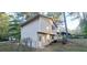 Exterior of home with classic siding and access to outdoor space at 3226 Bruckner Blvd, Snellville, GA 30078