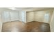 Spacious basement with laminate flooring, multiple closets, and an exterior door for easy access at 3226 Bruckner Blvd, Snellville, GA 30078