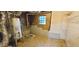Unfinished basement with exposed ducts, wood walls, and a small window at 3226 Bruckner Blvd, Snellville, GA 30078