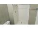 Shower stall with white tile and neutral-colored walls inside a bathroom at 3226 Bruckner Blvd, Snellville, GA 30078