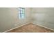This bedroom features neutral carpet and a window at 3226 Bruckner Blvd, Snellville, GA 30078
