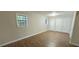 Large bedroom with laminate flooring and multiple closets, offering plenty of storage space at 3226 Bruckner Blvd, Snellville, GA 30078
