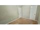 Neutral carpet and a closet are featured in this bedroom at 3226 Bruckner Blvd, Snellville, GA 30078