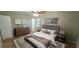 Comfortable bedroom featuring a ceiling fan, neutral walls, and stylish decor for a relaxing retreat at 3226 Bruckner Blvd, Snellville, GA 30078