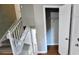 View of stairway with railing and closet on landing, showing the transition between floors at 3226 Bruckner Blvd, Snellville, GA 30078