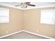 Bedroom featuring neutral walls, carpet floors, and natural light from two windows at 3400 Scott Dr, Austell, GA 30106