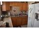 Functional kitchen featuring wood cabinets, countertops, and a stainless steel sink at 3400 Scott Dr, Austell, GA 30106