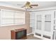 Cozy living room featuring built in cabinets, neutral walls, and a window at 3400 Scott Dr, Austell, GA 30106