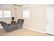 Comfortable living room with tile flooring, recliner, and neutral paint at 3400 Scott Dr, Austell, GA 30106