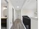 Hallway features hardwood floors and modern fixtures at 5399 Emily Cir, Ellenwood, GA 30294