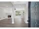 Inviting view through a front door into an open living area with a fireplace at 5399 Emily Cir, Ellenwood, GA 30294