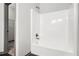 Shower showcasing white tile and modern fixtures at 876 Ivydale Ln # 63, Lawrenceville, GA 30045
