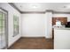 Bright dining area with hardwood floors and a view of the kitchen at 876 Ivydale Ln # 63, Lawrenceville, GA 30045