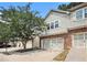 Inviting townhome with a well-maintained exterior and convenient garage parking at 876 Ivydale Ln # 63, Lawrenceville, GA 30045