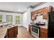 Well-equipped kitchen features modern appliances and ample cabinet space at 876 Ivydale Ln # 63, Lawrenceville, GA 30045