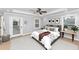 Bedroom featuring recessed lighting, ceiling fan, carpet flooring, and ensuite door to outside at 1103 Coleman Sw St, Atlanta, GA 30310