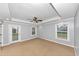 Spacious bedroom with recessed lighting, ceiling fan, and french doors to outside at 1103 Coleman Sw St, Atlanta, GA 30310