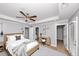 Stylishly furnished bedroom features a desk, ceiling fan, and neutral tones at 1103 Coleman Sw St, Atlanta, GA 30310