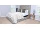 Bright bedroom with plush carpeting, large windows, and a comfortable bed at 1103 Coleman Sw St, Atlanta, GA 30310