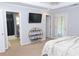 Bedroom featuring ensuite bathroom and french door to outside at 1103 Coleman Sw St, Atlanta, GA 30310