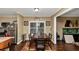 Cozy eat-in kitchen dining area featuring a table, chairs, and stainless steel appliances at 1103 Coleman Sw St, Atlanta, GA 30310