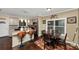 Well-lit eat-in kitchen featuring an island with barstool seating and modern appliances at 1103 Coleman Sw St, Atlanta, GA 30310
