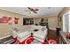 Spacious living room boasts hardwood floors, neutral walls, and an expansive sectional sofa at 1103 Coleman Sw St, Atlanta, GA 30310