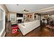 Inviting living room featuring an open layout, fireplace, and hardwood floors throughout at 1103 Coleman Sw St, Atlanta, GA 30310